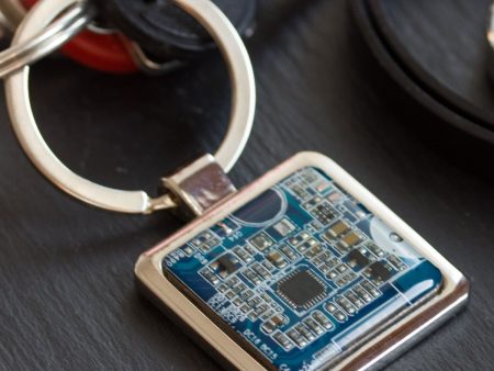 Unique keychain with circuit board piece Supply