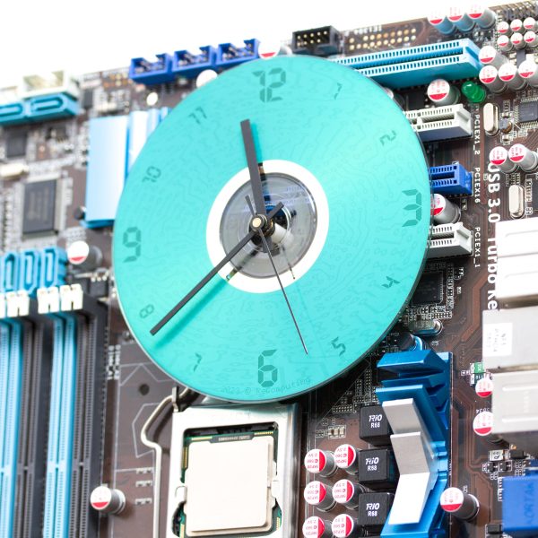 Geeky Wall Clock made of a black   dark brown circuit board with a blue clock face Online Sale